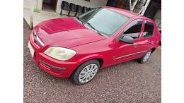 CHEVROLET - PRISMA - 2009/2009 - Vermelha - R$ 24.000,00