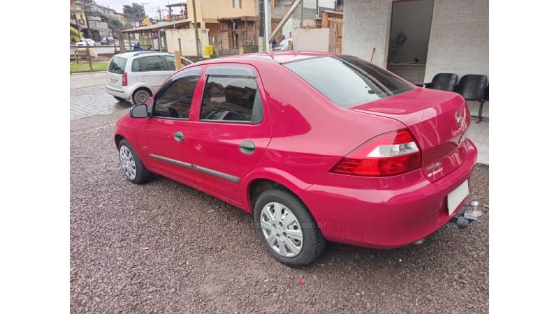 CHEVROLET - PRISMA - 2009/2009 - Vermelha - R$ 24.000,00