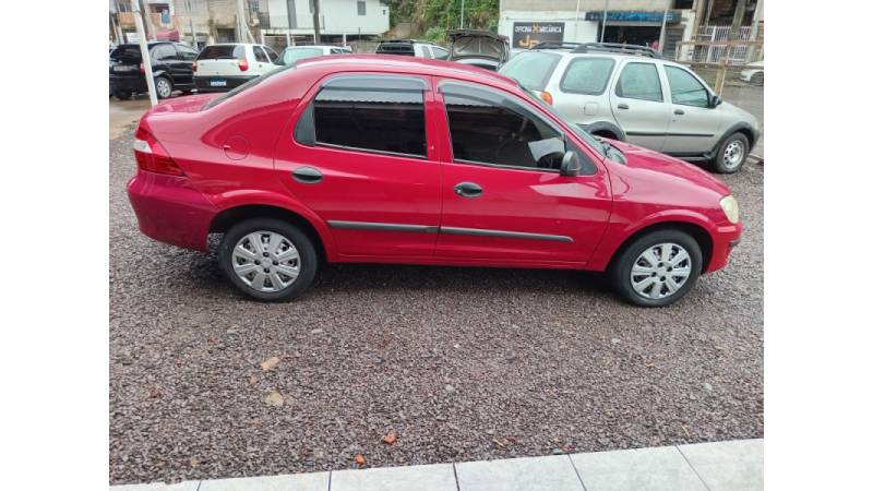 CHEVROLET - PRISMA - 2009/2009 - Vermelha - R$ 24.000,00